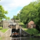 Travel through the Bingley Five Rise locks on a canal boat holiday
